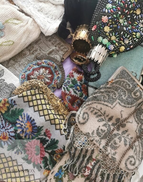 Large collection of beaded purses from late 1800s and early 1900s